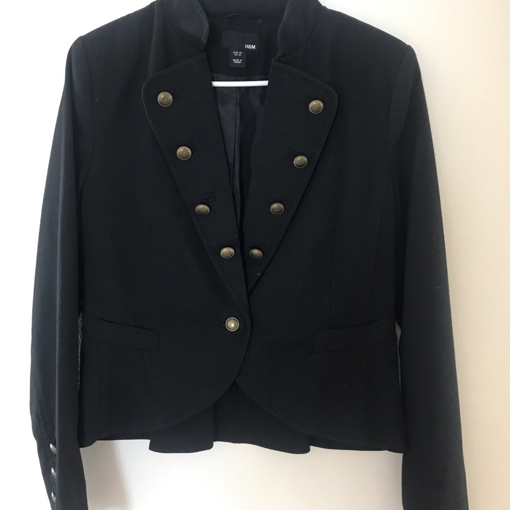 Black jacket. Gold buttons. Good condition, exterior and interior.